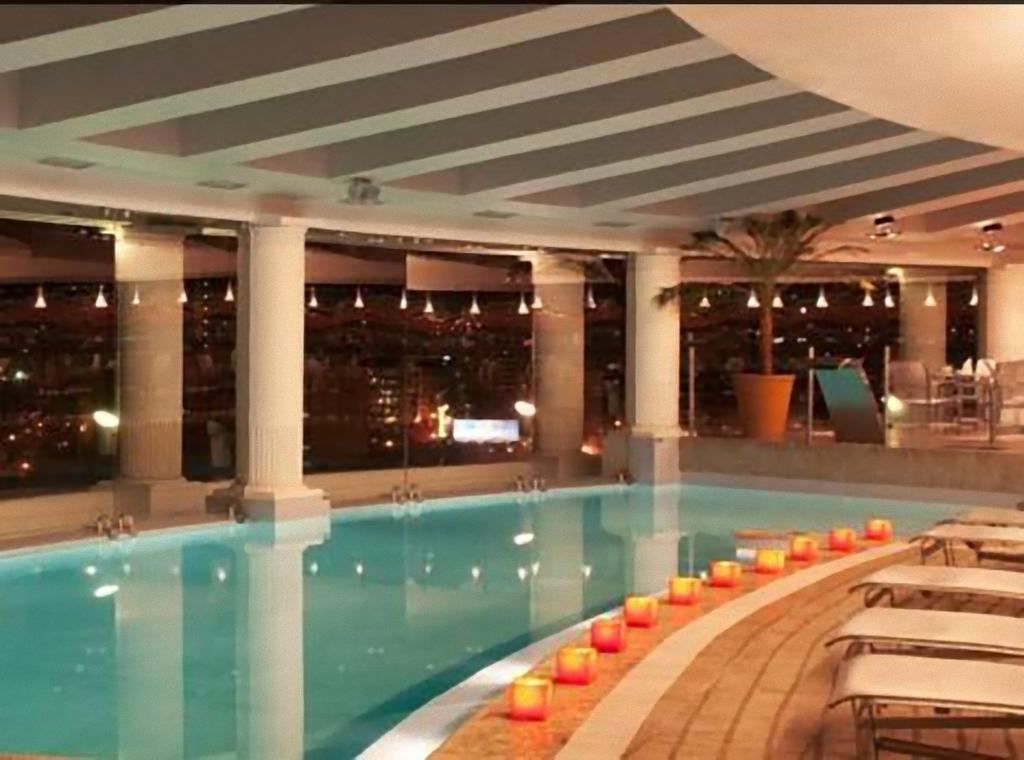 Enjoy Vina Del Mar Hotell Exteriör bild The pool at the 1018